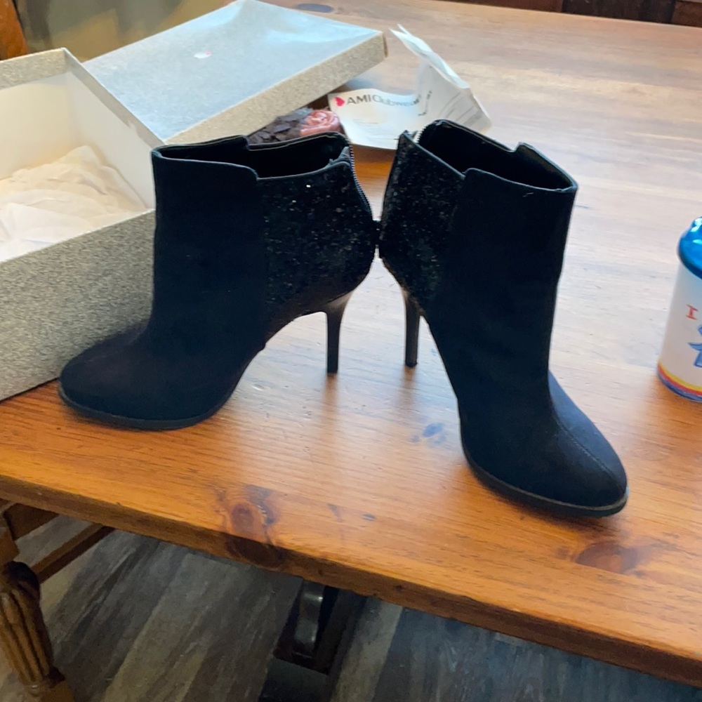 Gently used, zip up, glitter heel boots.